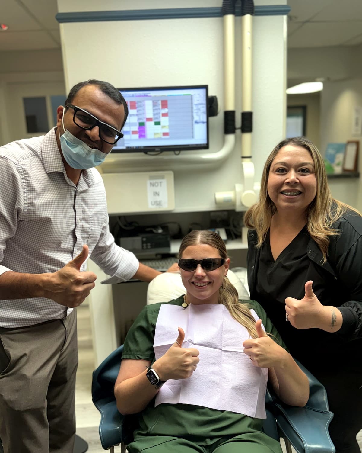Patient after professional teeth whitening treatment at Dual Arc Dental